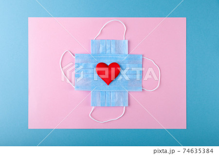 Red hearts and anti-epidemic blue medical protective mask 74635384