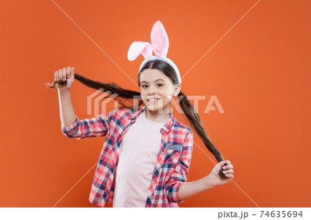 happy easter kid girl wearing ears for bunny hunt in easter happy easter kid girl wearing ears for bunny hunt in easter 74635694