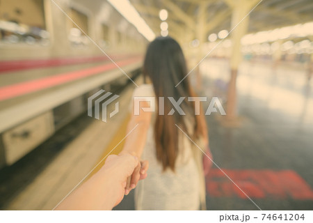 Young beautiful Asian tourist woman at the railway station in Bangkok, Thailand 74641204