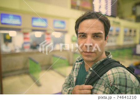 Handsome Persian tourist man at the railway station in Bangkok, Thailand Handsome Persian tourist man at the railway station in Bangkok, Thailand 74641210