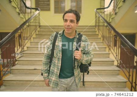 Handsome Persian tourist man at the railway station in Bangkok, Thailand Handsome Persian tourist man at the railway station in Bangkok, Thailand 74641212