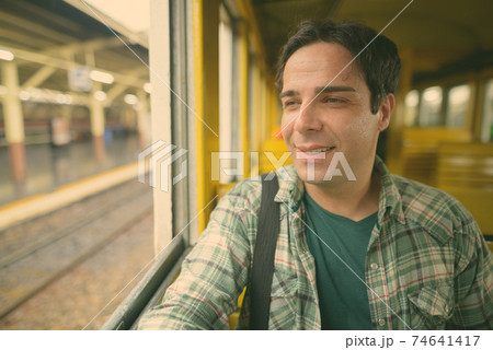Handsome Persian tourist man at the railway station in Bangkok, Thailand Handsome Persian tourist man at the railway station in Bangkok, Thailand 74641417