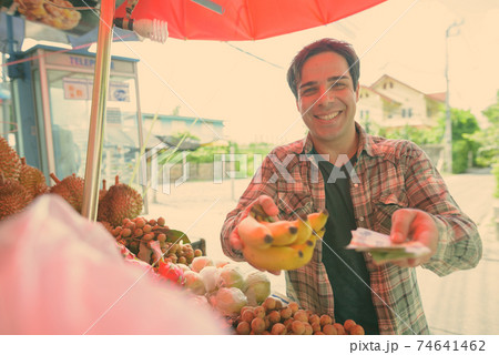 Handsome Persian tourist man exploring the city of Bangkok, Thailand Handsome Persian tourist man exploring the city of Bangkok, Thailand 74641462