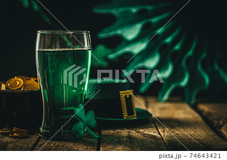 St. Patricks day concept - green beer and symbols 74643421