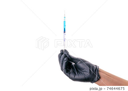 Vaccine isolated. Doctor hand in medical glove hold syringe with needle for protection flu virus and coronavirus. Covid vaccine isolated on white. Disease care hospital prevention. Vaccine isolated. Doctor hand in medical glove hold syringe with needle for protection flu virus and coronavirus. Covid vaccine isolated on white. Disease care hospital prevention. 74644675