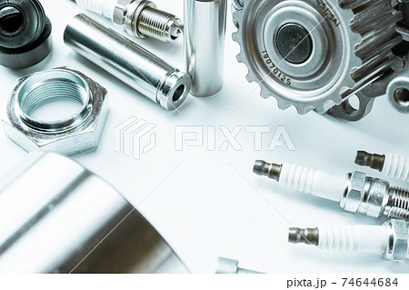 Sapre parts. Auto motor mechanic spare or automotive piece on white background. Set of new metal car part. Automobile engine service. Sapre parts. Auto motor mechanic spare or automotive piece on white background. Set of new metal car part. Automobile engine service. 74644684