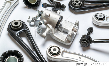 Accessories for cars. Set of new metal car part. Auto motor mechanic spare or automotive piece isolated on white background. Repair and vehicle service. Accessories for cars. Set of new metal car part. Auto motor mechanic spare or automotive piece isolated on white background. Repair and vehicle service. 74644972