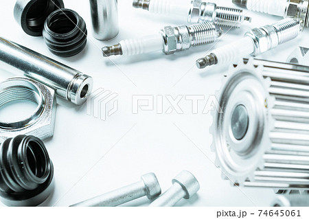 Car engine parts. Auto motor mechanic spare or automotive piece on white background. Set of new metal car part. Automobile engine service. Car engine parts. Auto motor mechanic spare or automotive piece on white background. Set of new metal car part. Automobile engine service. 74645061