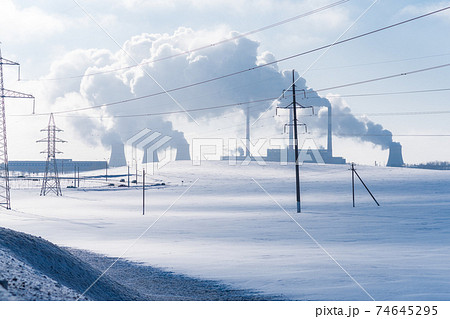 Thermal power plant pipes in winter. Industrial landscape. Thermal power plant pipes in winter. Industrial landscape. 74645295