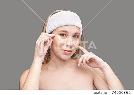 Eye patch procedure. Facial treatment. Dermatology spa. Detox therapy 74650369