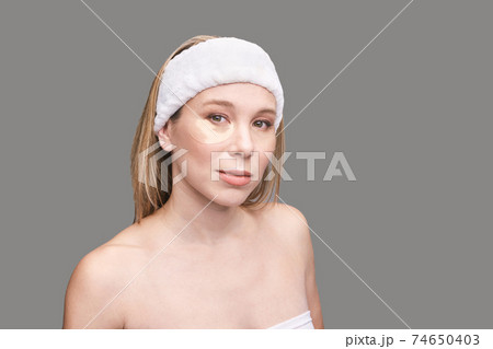 Eye patch procedure. Facial treatment. Dermatology spa. Detox therapy 74650403
