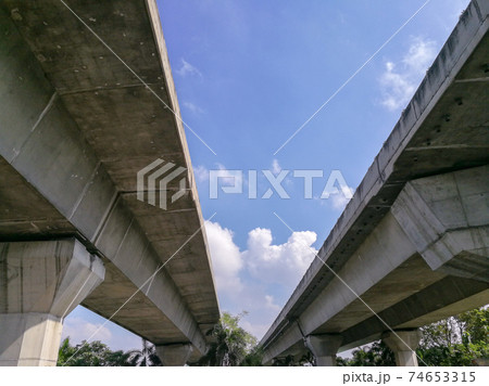 A stunning view of the highway underneath the expressway is ideal for travel or class illustrations. 74653315