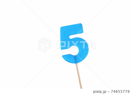 lolipop in number 5 shape. sweet candy on wooden stick.  74655779