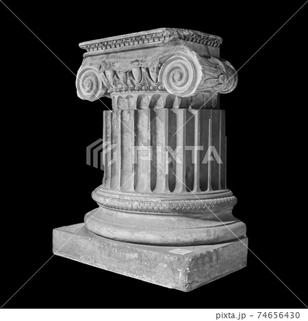 Capital of the ancient Greek Ionic order isolated over black background 74656430