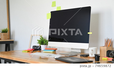 Computer on graphic design workspace. 74659872