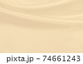 Smooth elegant golden silk or satin luxury cloth texture as wedding background. Luxurious background design. In Sepia toned. Retro style 74661243