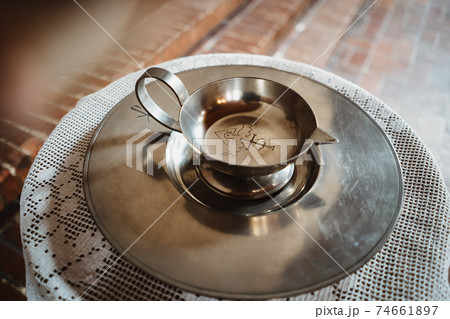photo of a baptizing pot in a church photo of a baptizing pot in a church 74661897