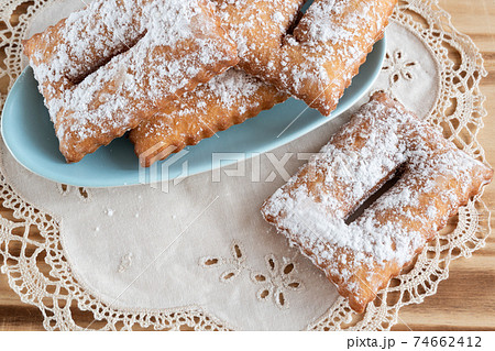 Homemade sweet typical french merveilles 74662412