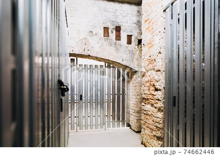 storage units inside of an old basement 74662446