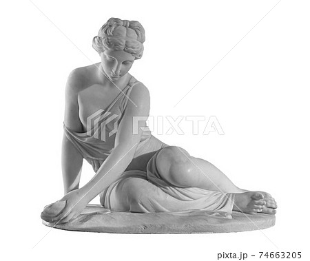 Ancient marble statue of a nude woman. Antique naked female sculpture. Sculpture isolated on white background Ancient marble statue of a nude woman. Antique naked female sculpture. Sculpture isolated on white background 74663205