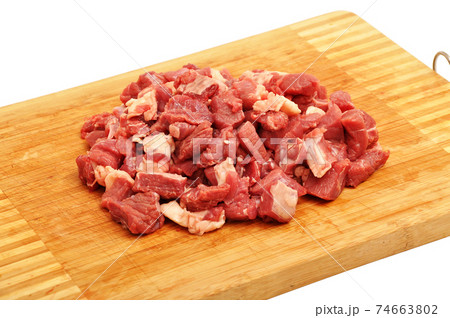 Very fresh chopped red raw meat on cutting board 74663802