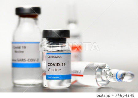 Vaccine for virus in small bottles Vaccine for virus in small bottles 74664349
