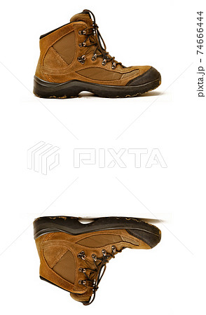 Hiking shoes and a white background, Sturdy hiking boots Hiking shoes and a white background, Sturdy hiking boots 74666444
