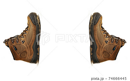 Hiking shoes and a white background, Sturdy hiking boots Hiking shoes and a white background, Sturdy hiking boots 74666445