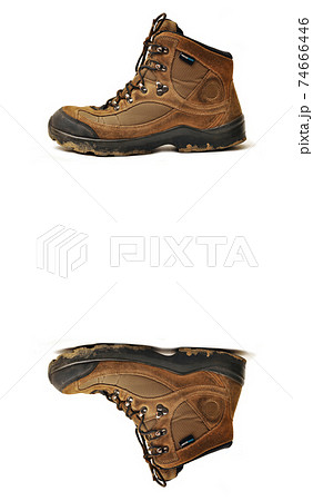 Hiking shoes and a white background, Sturdy hiking boots Hiking shoes and a white background, Sturdy hiking boots 74666446