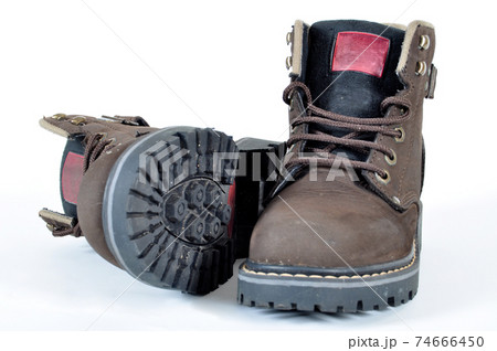 Hiking shoes and a white background, Sturdy hiking boots 74666450