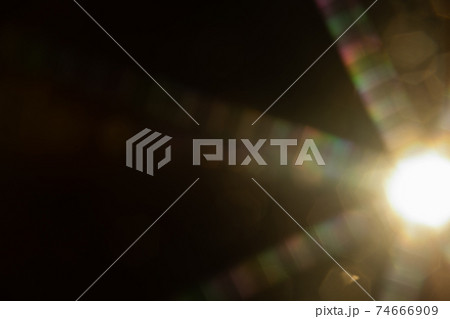 Abstract sun flare. The lens flare is subject to digital correction 74666909