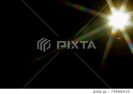 Abstract sun flare. The lens flare is subject to digital correction Abstract sun flare. The lens flare is subject to digital correction 74666910