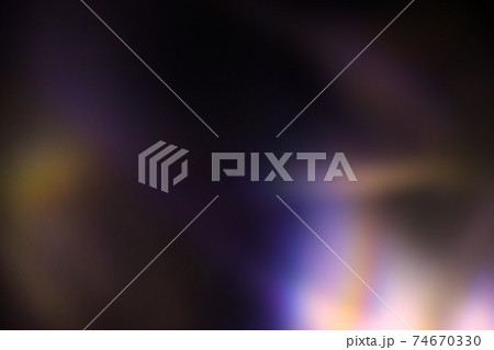 Blur colorful rainbow light leaks on black background 74670330