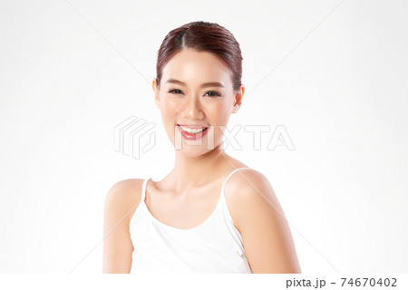 Beautiful young asian woman with clean fresh skin on white background, Face care, Facial treatment,  74670402