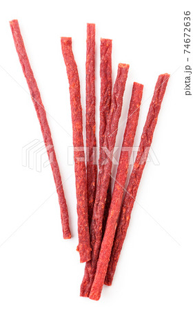 Dried salmon sticks on a white background. The view from top Dried salmon sticks on a white background. The view from top 74672636