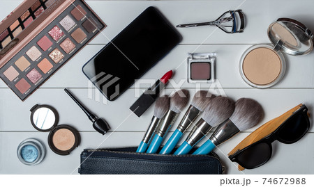 Set of decorative cosmetics and makeup set over the white background. Top view. Cosmetics set. Flat lay. Close-up. Set of decorative cosmetics and makeup set over the white background. Top view. Cosmetics set. Flat lay. Close-up. 74672988