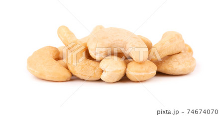 Cashew nuts isolated on white background. Roasted cashew nuts. Cashew nuts isolated on white background. Roasted cashew nuts. 74674070
