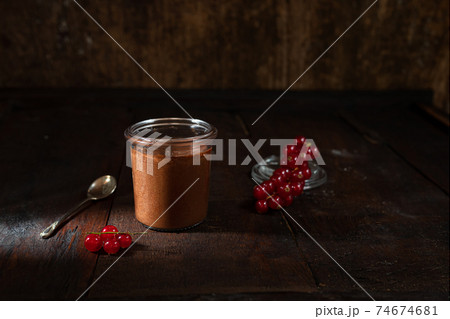 Chocolate mousse in glass and berries Chocolate mousse in glass and berries 74674681