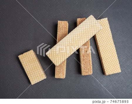 Neapolitan waffles on a dark gray background. Close-up. Flat lay 74675893
