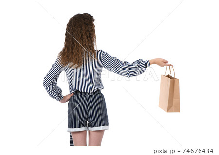 Child with a packet isolated on white 74676434