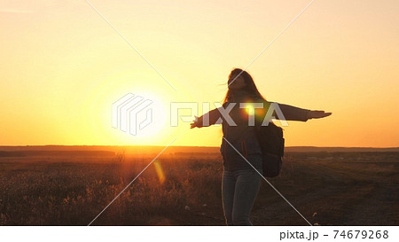 happy girl teen child closed her eyes dream. teenage kid wants a dream come true portrait at sunset. woman daughter silhouette dream of a happy childhood. free face sister closed eyes 74679268