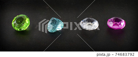 Jewel or gems on black shine color, Collection of many different natural gemstones. Jewel or gems on black shine color, Collection of many different natural gemstones. 74683792