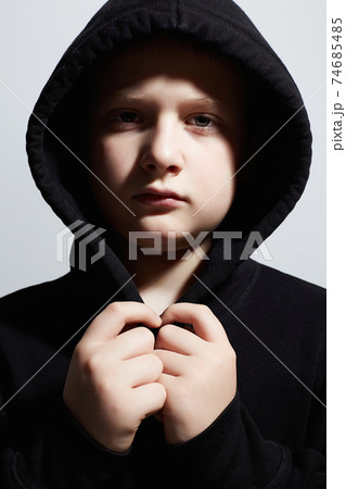 little boy in black hoodie. teenager boy. Child little boy in black hoodie. teenager boy. Child 74685485
