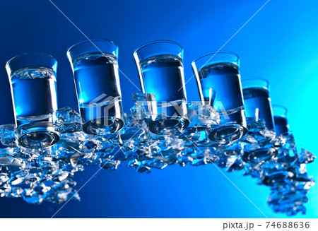 Glasses of Russian vodka with ice. Glasses of Russian vodka with ice. 74688636