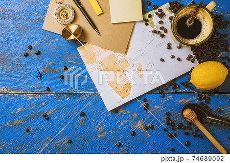 accessories for the traveler on the old background on the on blue wood table. accessories for the traveler on the old background on the on blue wood table. 74689092