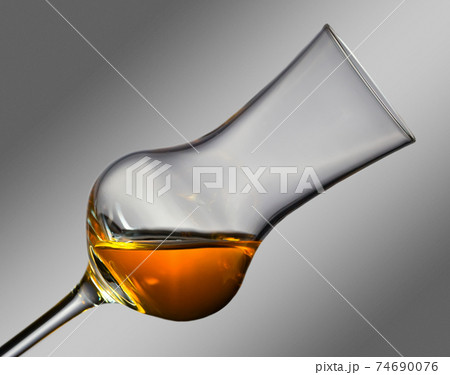 glass of alcoholic drink glass of alcoholic drink 74690076
