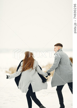 Winter snow couple love story Winter snow couple love story 74690296