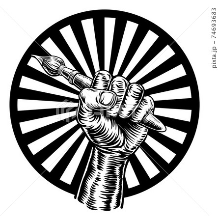 Hand Holding Artists Paintbrush 74693683