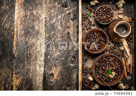 Fresh coffee with fried grains. Fresh coffee with fried grains. 74694991