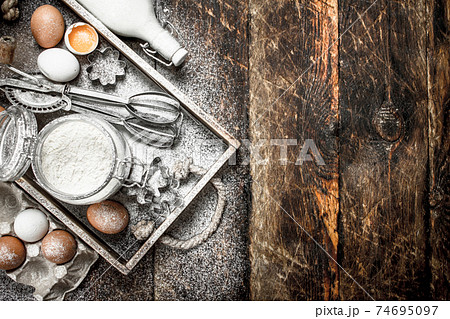 Baking background. Ingredients for fresh dough. Baking background. Ingredients for fresh dough. 74695097